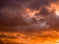 A dramatically lit winter cloudy sky at sunset Royalty Free Stock Photo