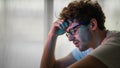 Man sitting alone with desperate feeing and depressed from unemployment Royalty Free Stock Photo