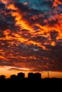 Drammatic evening sky over city scape silhouette Royalty Free Stock Photo
