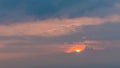 Crimson Sunrise behind Clouds and Alps Mountains Royalty Free Stock Photo