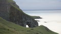 Drangarnir Sea Stack Peaks rising out of the atlantic ocean on the Faroe Islands.