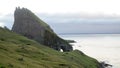 Drangarnir Sea Stack Peaks rising out of the atlantic ocean on the Faroe Islands.