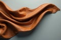Draped amber leather fabric displays soft texture and subtle drape against a neutral background. Generative AI Royalty Free Stock Photo