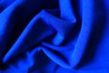 Draped bright electric blue fabric