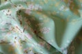Draped mint green thin rayon fabric Royalty Free Stock Photo