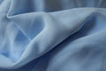 Draped lightweight sky blue polyester chiffon fabric Royalty Free Stock Photo