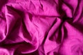 Draped magenta colored plain linen fabric