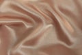 Draped beige satin background