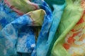 Draped rayon in blue, green, yellow and orange