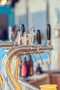 Draught beer taps in a bar. Royalty Free Stock Photo