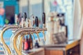 Draught beer taps in a bar. Royalty Free Stock Photo