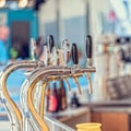 Draught beer taps in a bar. Royalty Free Stock Photo