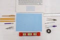 Draughtsmanship equipment for drawing on millimeter paper with laptop Royalty Free Stock Photo