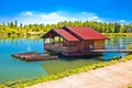 Drava river floating wooden cabin