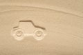 Draw car on beach sand. Car rental concept. Insurance. Travel. Summer time. Creative.