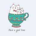 Draw character design cute kawaii cat in beauty cup of tea.Isolated on blue.Doodle cartoon style.