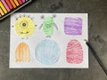 Draw funny monsters on paper with a pencil. Lesson learning for children.