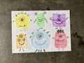 Draw funny monsters on paper with a pencil. Lesson learning for children.