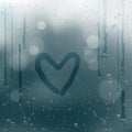 Draw heart on rain water drops bokeh Royalty Free Stock Photo