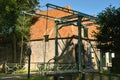 Drawbridge at the entrance of the open-air museum in Enkhuizen with the historic facades and the church in the background