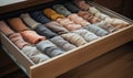 Drawer full of neatly folded socks in perfect order Creating using generative AI tools