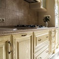 drawers, kitchen, interior built-in dishwasher, kitchen countertop white vase with daisies