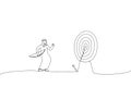Drawing of arab businessman finally hit target after too many unsuccessful tries. Metaphor for effectiveness and efficiency to