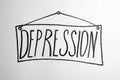 Drawing of board with written word DEPRESSION