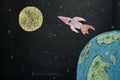 Drawing chalk on the Board rocket flying from earth to the moon, the journey Royalty Free Stock Photo