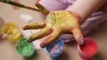 Drawing child hands painted in colorful paint girl baby artist kid creative children education. Toddler finger paint