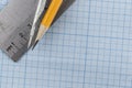 drawing compass, pencil, and ruler on graph paper background Royalty Free Stock Photo