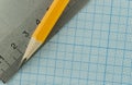 drawing compass, pencil, and ruler on graph paper background Royalty Free Stock Photo