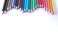 A set of coloured pencils isolated on white background flat lay Royalty Free Stock Photo