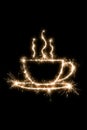 Drawing cup of coffee or tea with sparklers on a black background, imitation of a long exposure