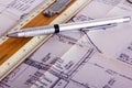 Drawing equipment with detailed architects house plans Royalty Free Stock Photo
