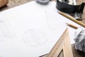 Drawing of geometry shapes on table. Designer`s workplace