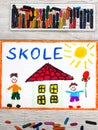 Drawing: German word SCHOOL, school building and happy children. Royalty Free Stock Photo