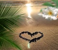 Drawing heart on beach sand tropical flowers and palm leaves ,sea water wave sunny day summer holiday romantic background