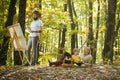 Drawing from life. Painter artist with family relaxing in forest. Painting in nature. Start new picture. Capture moment Royalty Free Stock Photo