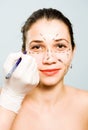 Drawing lines for facial plastic surgery Royalty Free Stock Photo