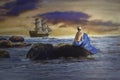 Mermaid on rock looking at sailing ship