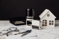 Drawing with model of house, calculator and stamps, building costs concept Royalty Free Stock Photo