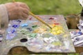 Drawing with oil paints on the nature. Wonderful hobby Royalty Free Stock Photo