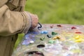 Drawing with oil paints on the nature. Wonderful hobby Royalty Free Stock Photo