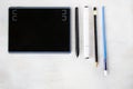 Drawing and painting tablet and styles pen and pencils on the white background Royalty Free Stock Photo