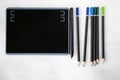 Drawing and painting tablet and styles pen and pencils on the white background Royalty Free Stock Photo