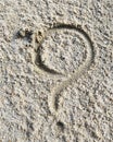 Drawing on sand at beach