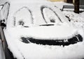 Drawing smiley face on the snow-covered car Royalty Free Stock Photo