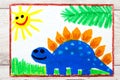 Drawing: Smiling dinosaur. Big blue stegosaurus.