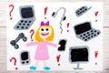 drawing: smiling little girl surrounded by electronic devices, phones, computers and tablets